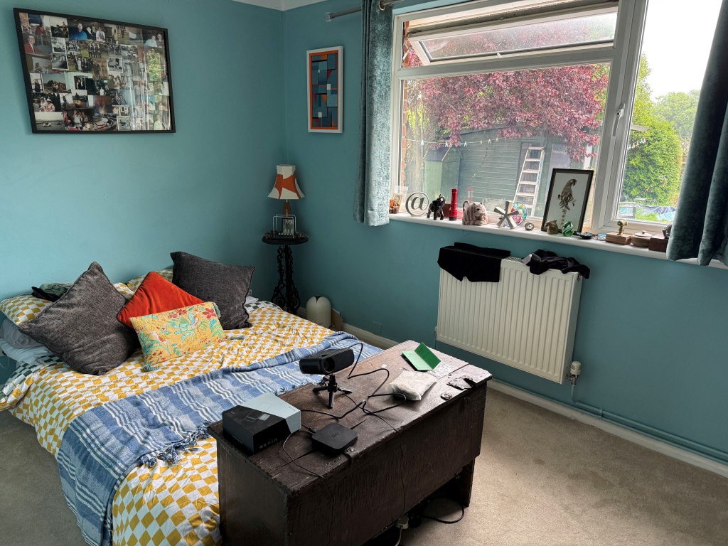 Lot: 137 - BUNGALOW WITH POTENTIAL IN FAVOURED LOCATION - Main bedroom with window overlooking rear garden